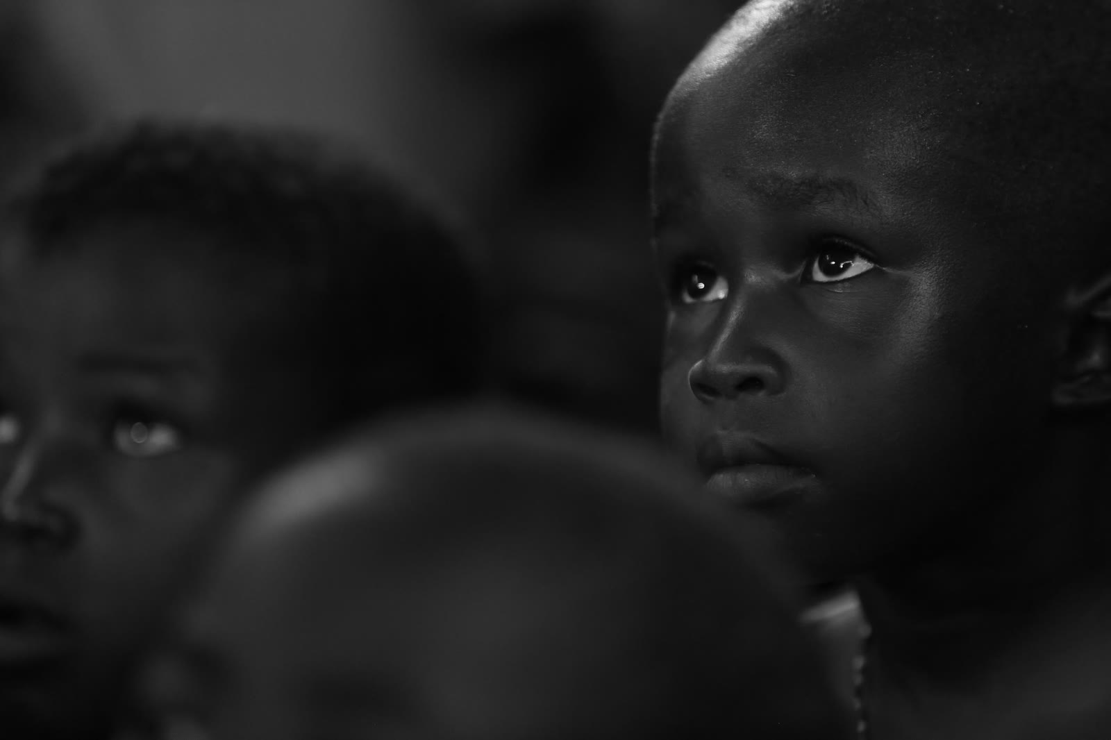 A boy looking upward in hope